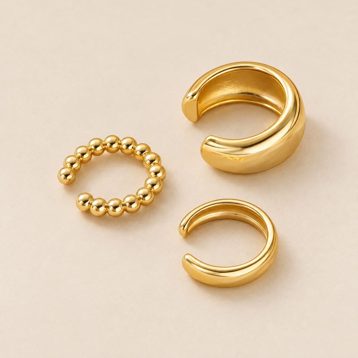 STÉPH Earcuff Set Nova – drie goudkleurige earcuffs hoofd