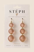 STÉPH blush roze oorbellen met zilverkleurige details