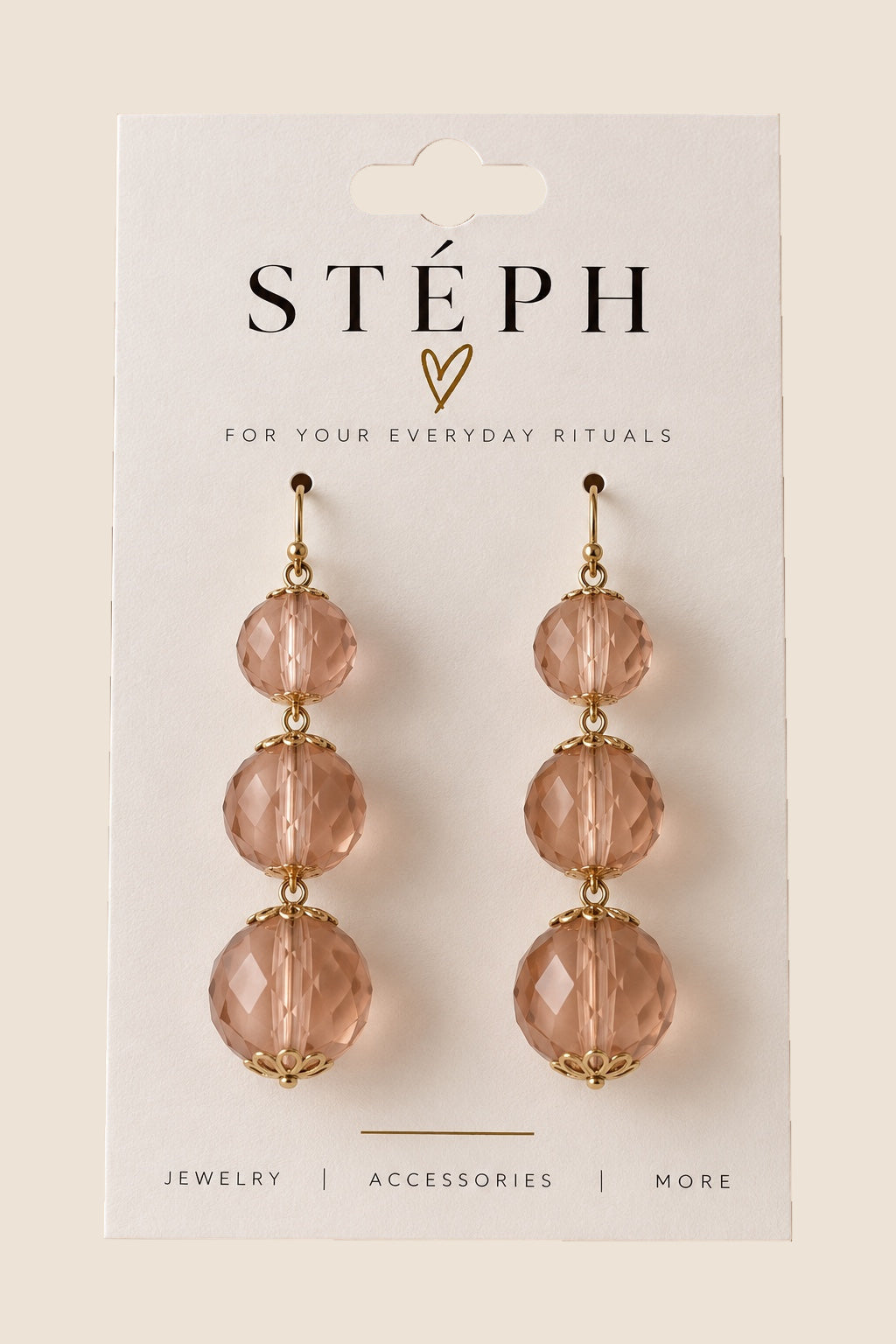 STÉPH blush roze oorbellen met zilverkleurige details